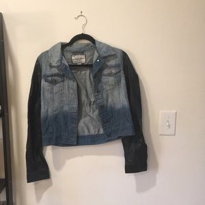 Denim jacket with leather sleeves